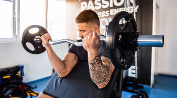 Male Athlete Doing Preacher Curls