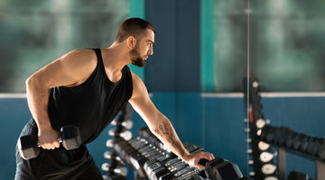 Athlete Doing Rows with Dumbbell