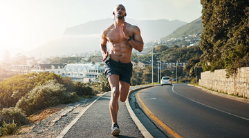 Male Athlete Running on the Road